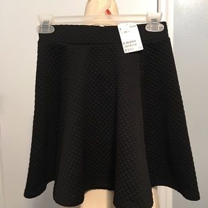 H&M’s  Divided Little Black Quilted Skirt